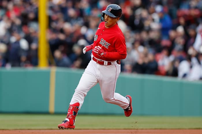 Masataka Yoshida rounds the bases after a home run for Boston.